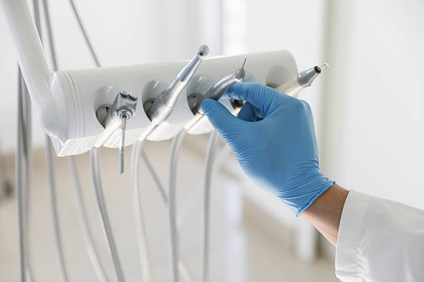 Professional Root Canal Treatment technician working in Ashtabula County County, OH